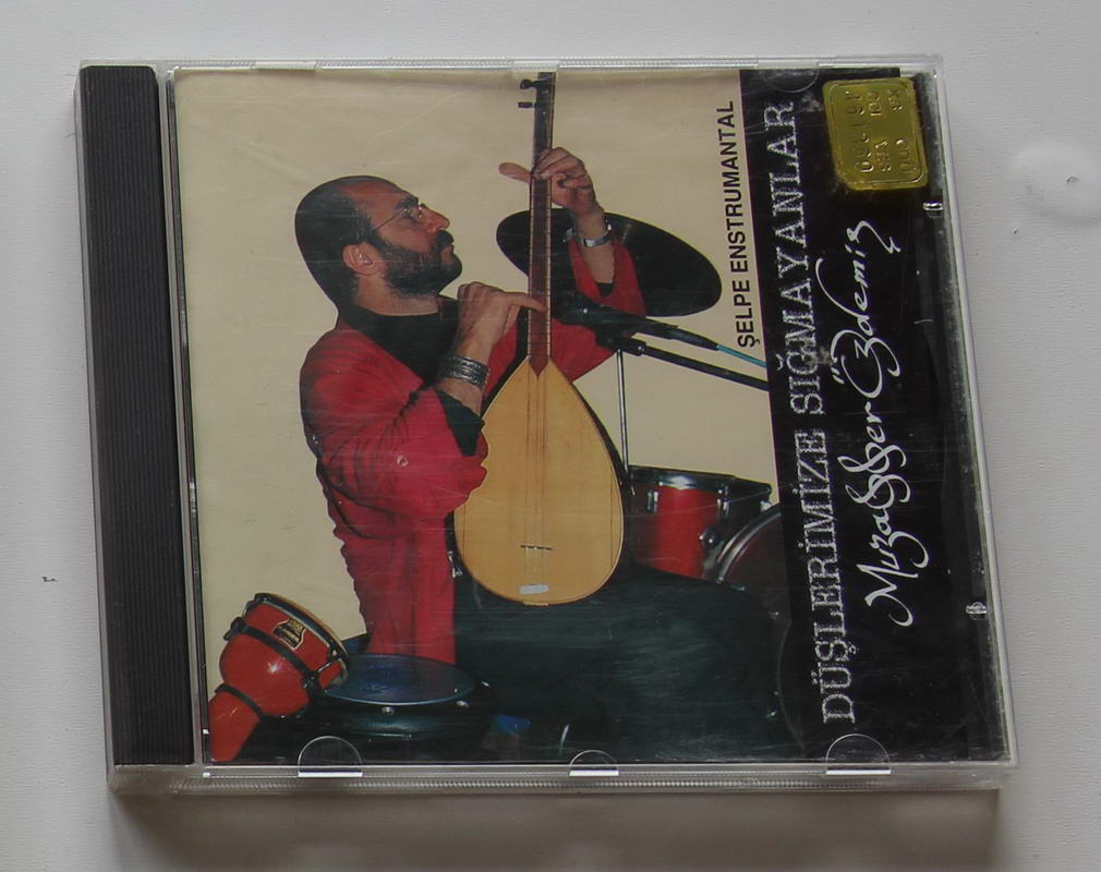 Muzaffer Özdemir - Düşlerimize Sığmayanlar Ön