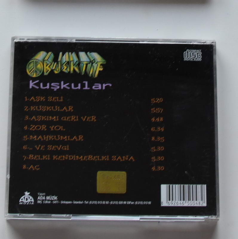 Objektif - Kuşkular Arka